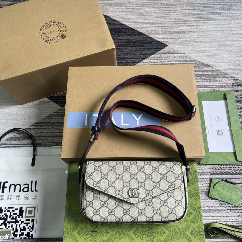 G*u*i top handle bags